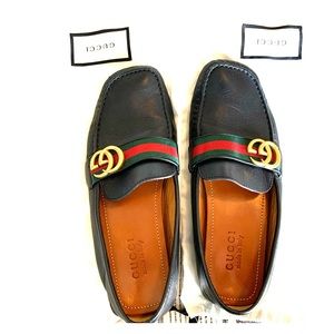 These are black leather Gucci driving shoes.